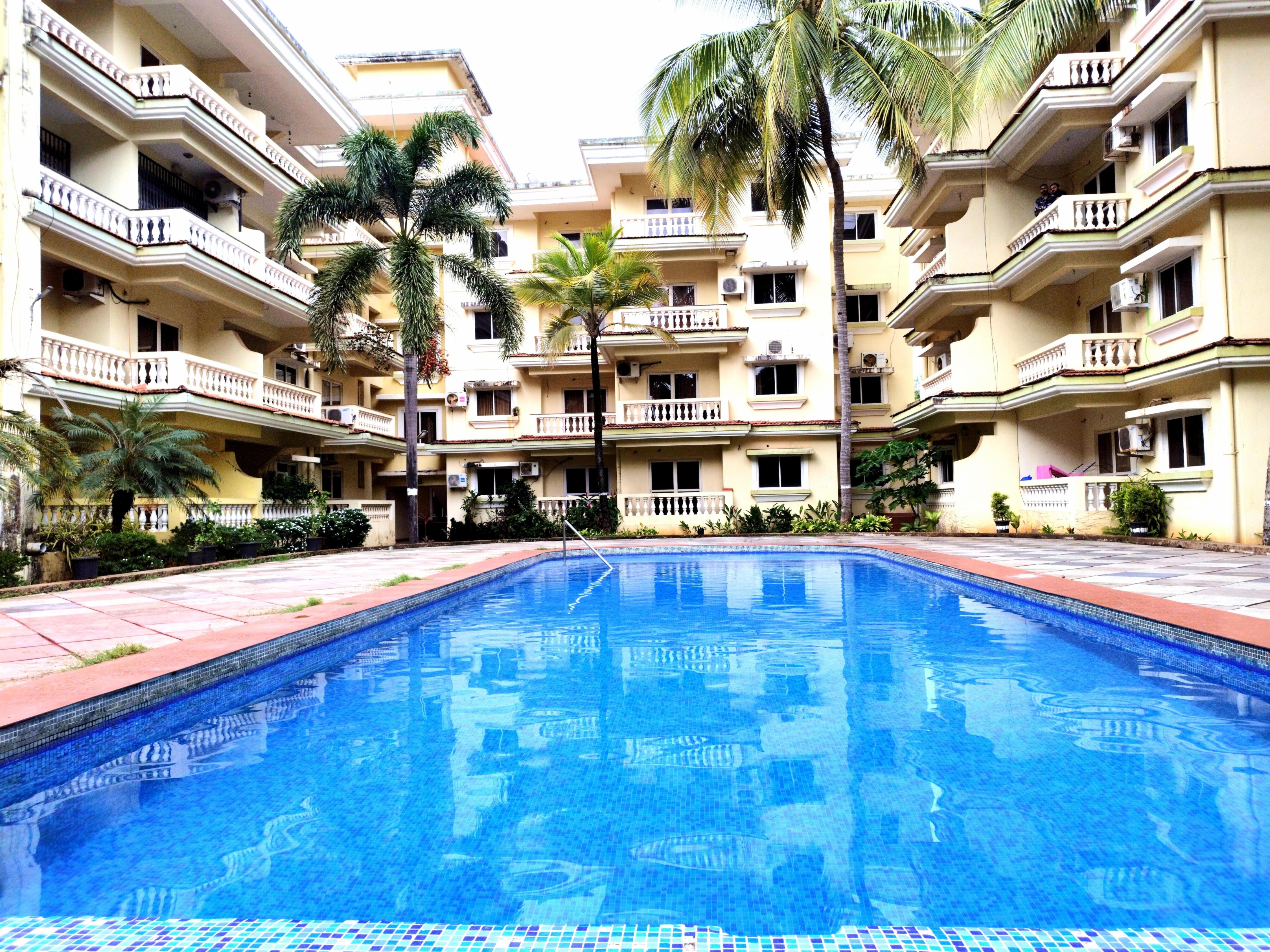 Seacoast Retreat | 2 BHK Condo with a Pool - Tap to explore photos