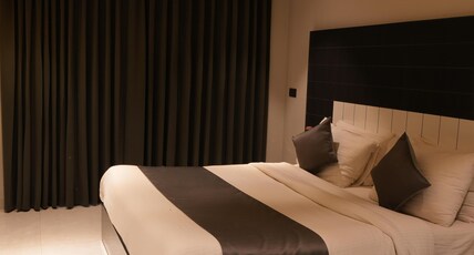 METRO STUDIOS NEAR ARTEMIS HOSPITAL Room Type - Premium Room with Private Balcony