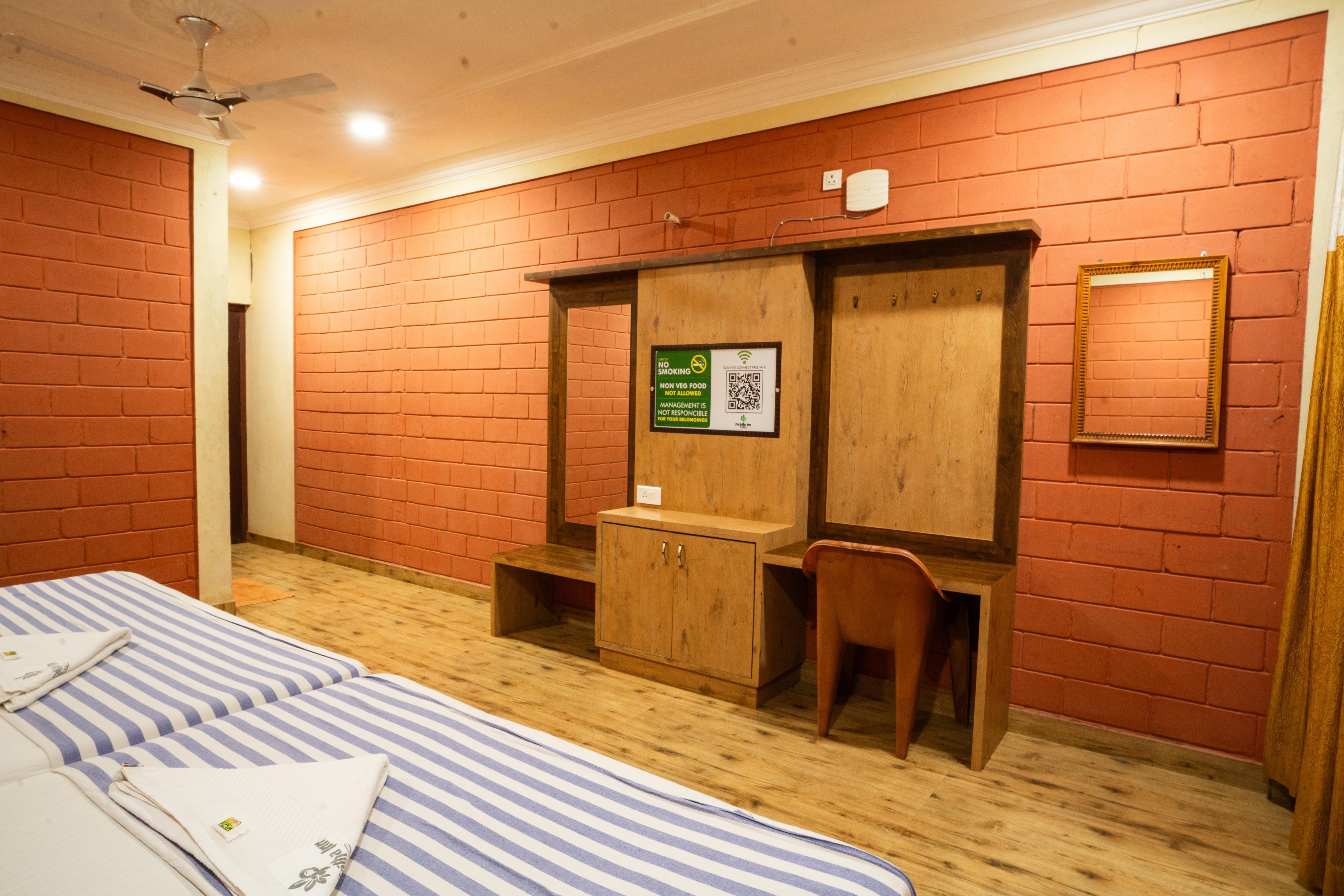 Hotel Parijatha Inn - Tap to explore photos