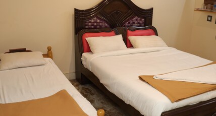 RKS RESIDENCY Room Type - Triple Room