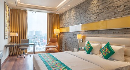 Treebo Premium Arista Room Type - Deluxe Room Treebo Premium Arista Room Type - Deluxe Room