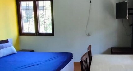 Small World Koramangala Room Type - Deluxe Room with attached bathroom