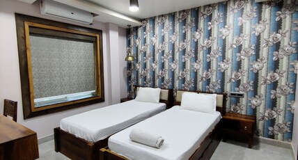 Shakuntala Residency Room Type - TWIN SHARE DELUXE ROOM