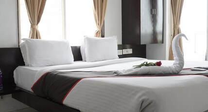 Basil Inn Room Type - Deluxe King Bed Room with City view