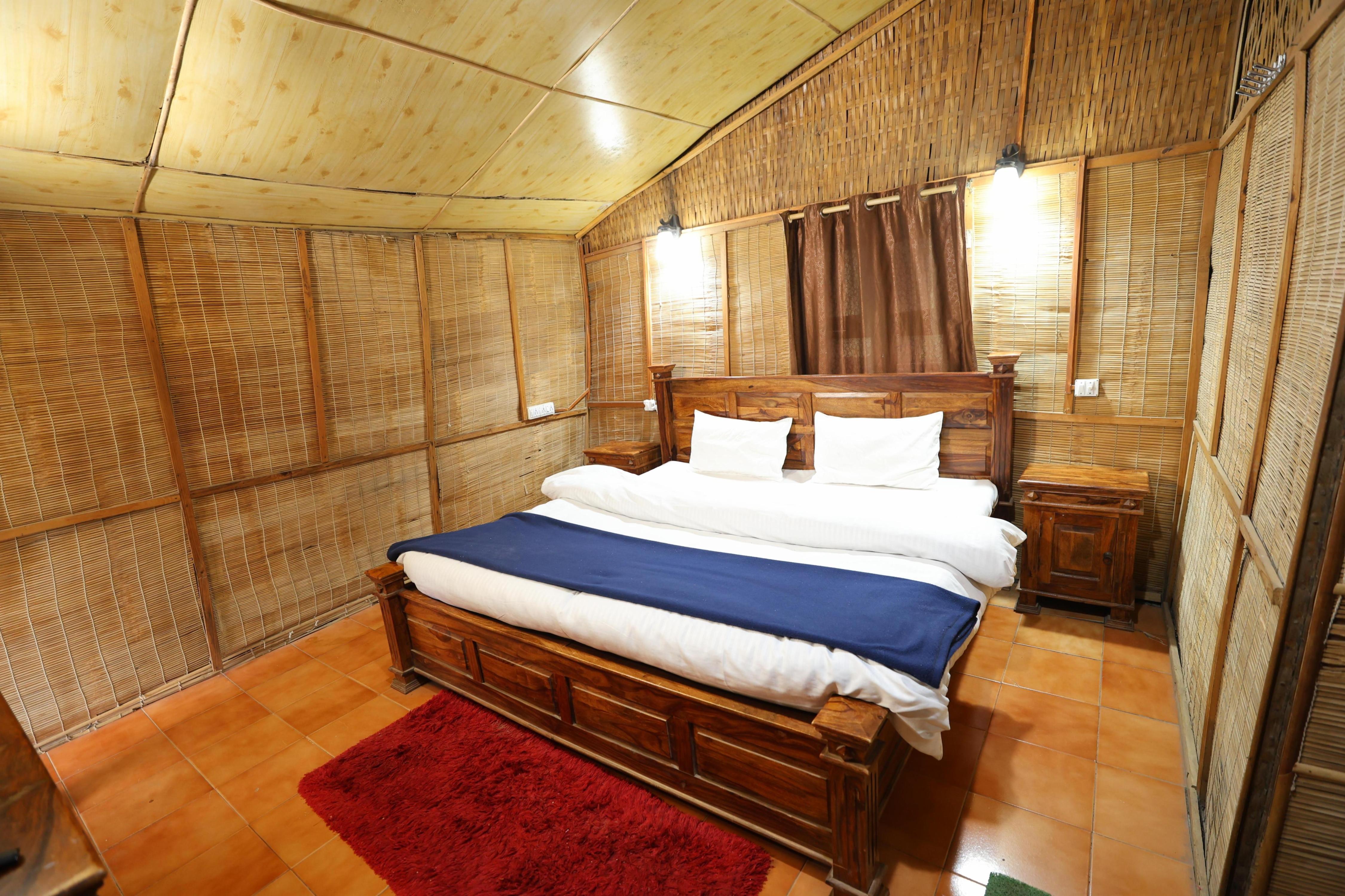 PINE WOOD NIRVANA Room Type - Deluxe Bamboo Cottages