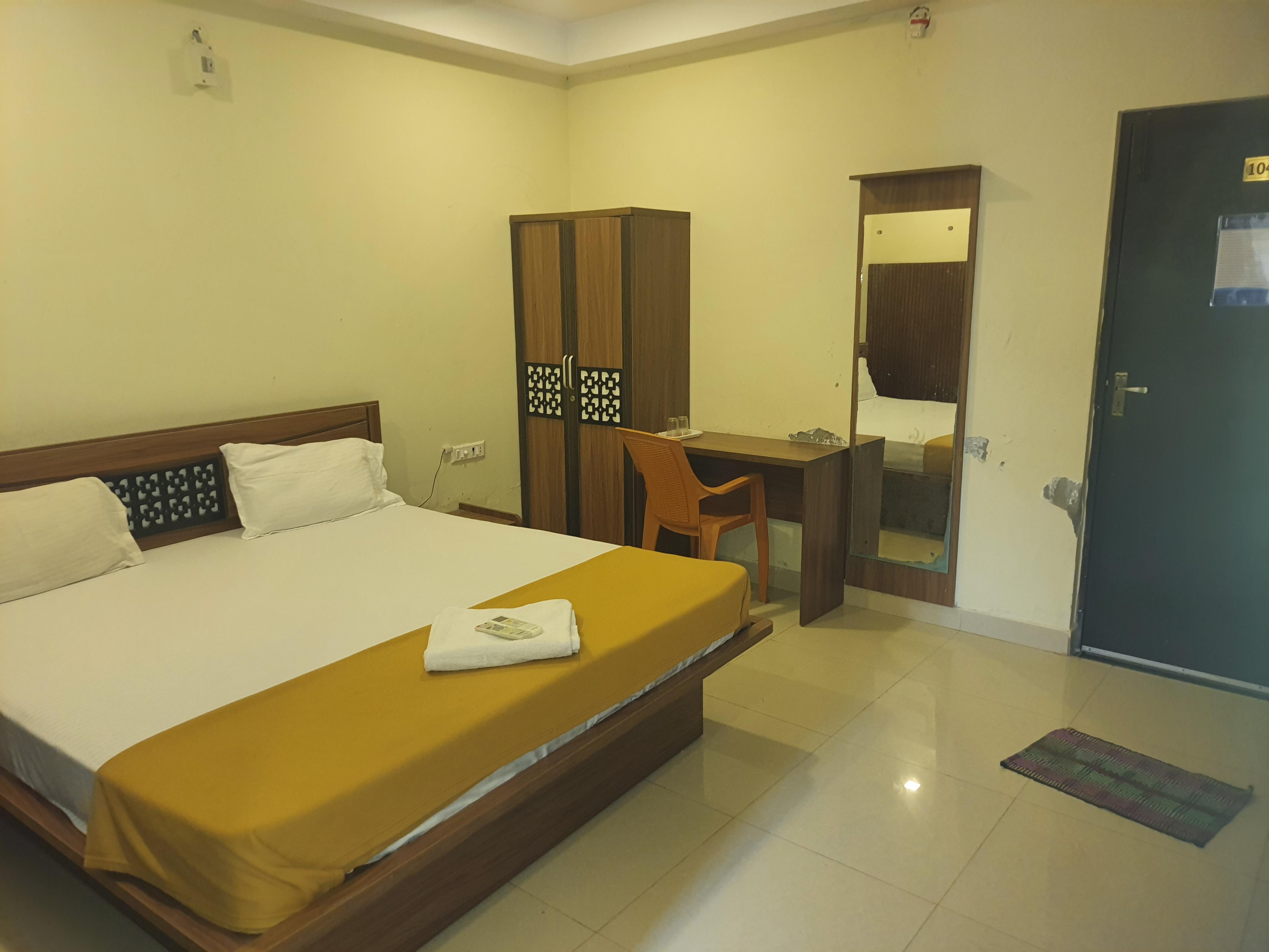 Hotel Santhosh Inn - Tap to explore photos