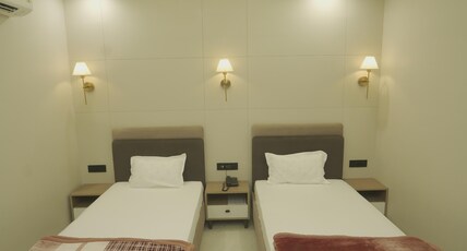 Satyam Palace Room Type - TWO BED ROOM
