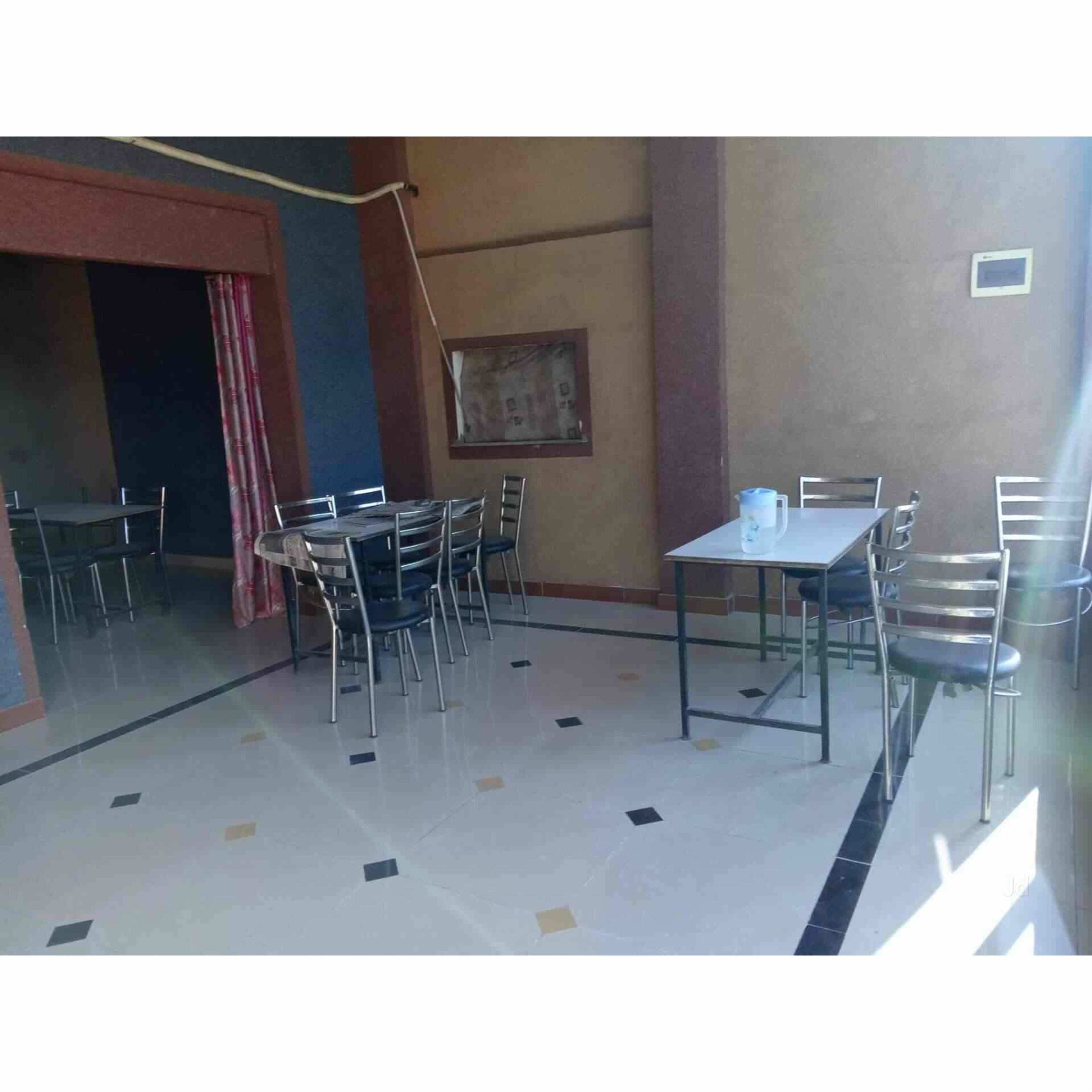 Santosh hotel - Tap to explore photos