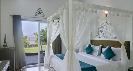 Elegant Waterfront Resort Room Type - Premium Cottage with Balcony