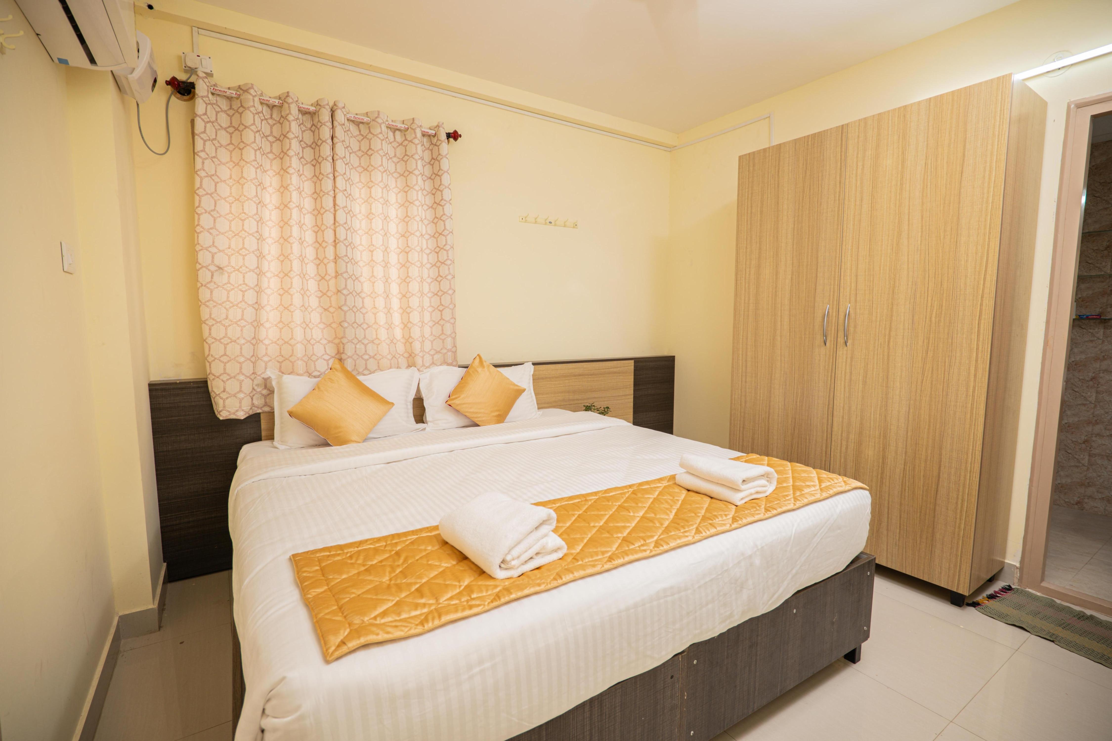 Guesture Stays - Dwellington, Electronics City Phase - Tap to explore photos
