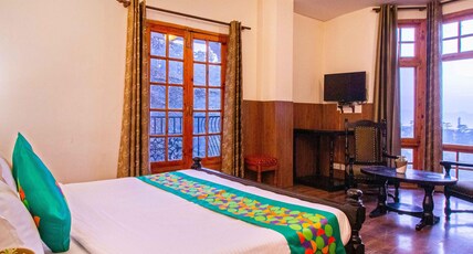 Treebo The Alpine Heritage Residency Room Type - Deluxe Room with Mountain View