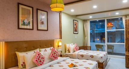 Zostel McLeodganj Room Type - Deluxe Triple Room (with balcony)