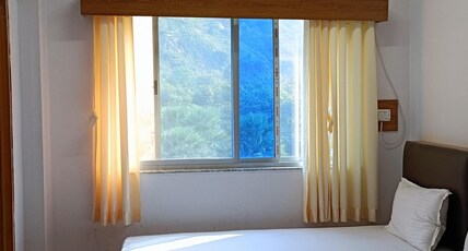 Hotel Rekha International Room Type - Deluxe Mountain View Room