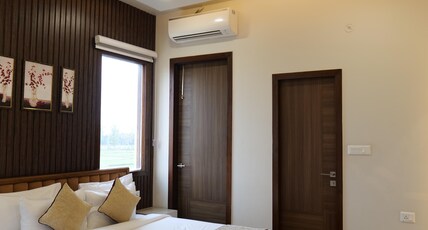 Tathastu Wilderness by The Kosi River Room Type - Deluxe Room with Balcony