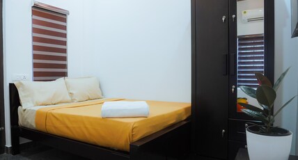 Beverly Suites | Rooms & 2 BHK Room Type - Budget Double Room AC