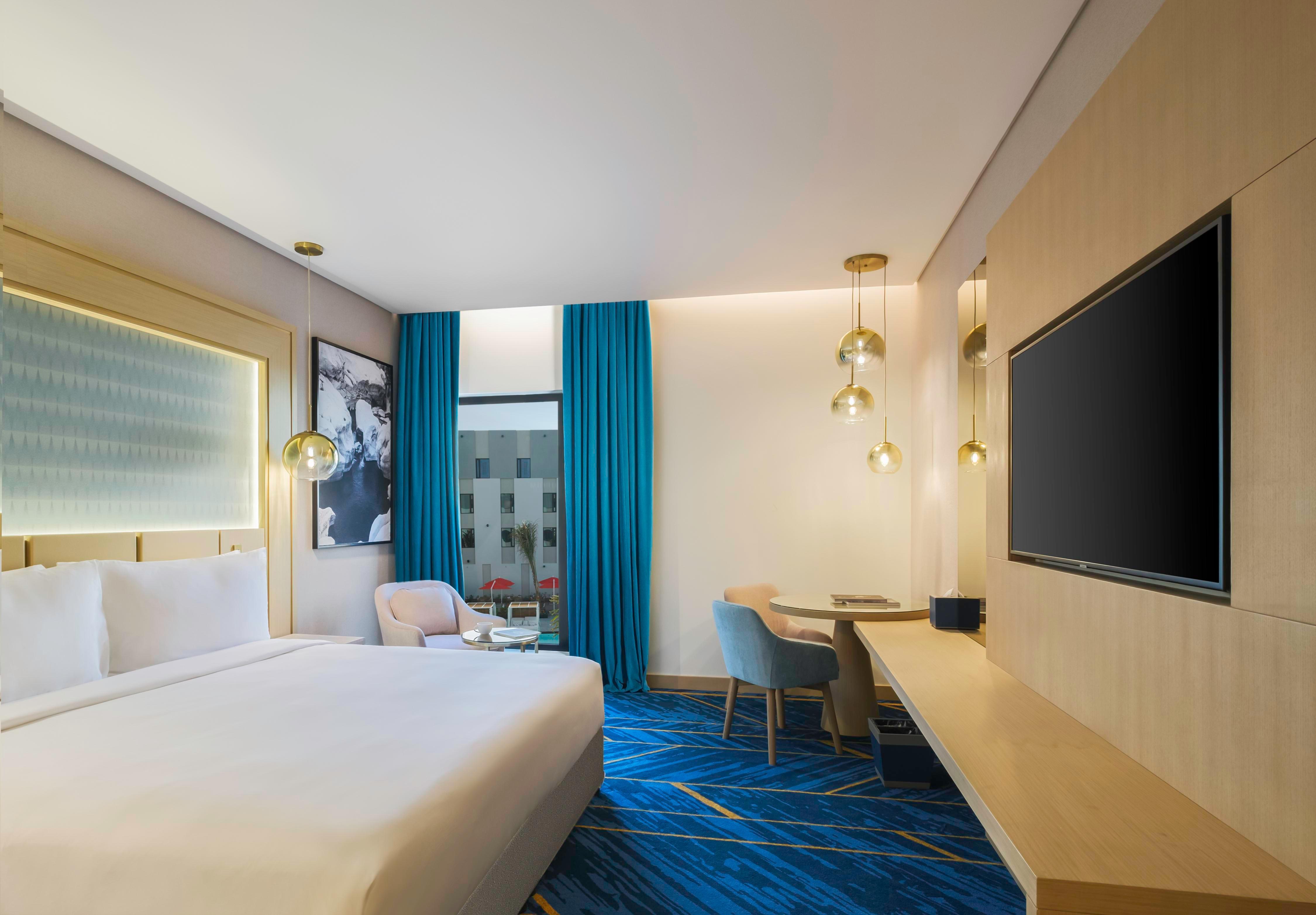 Maani Muscat Hotel and Suites Room Type - One Bedroom Apartment Pool View Maani Muscat Hotel and Suites Room Type - One Bedroom Apartment Pool View