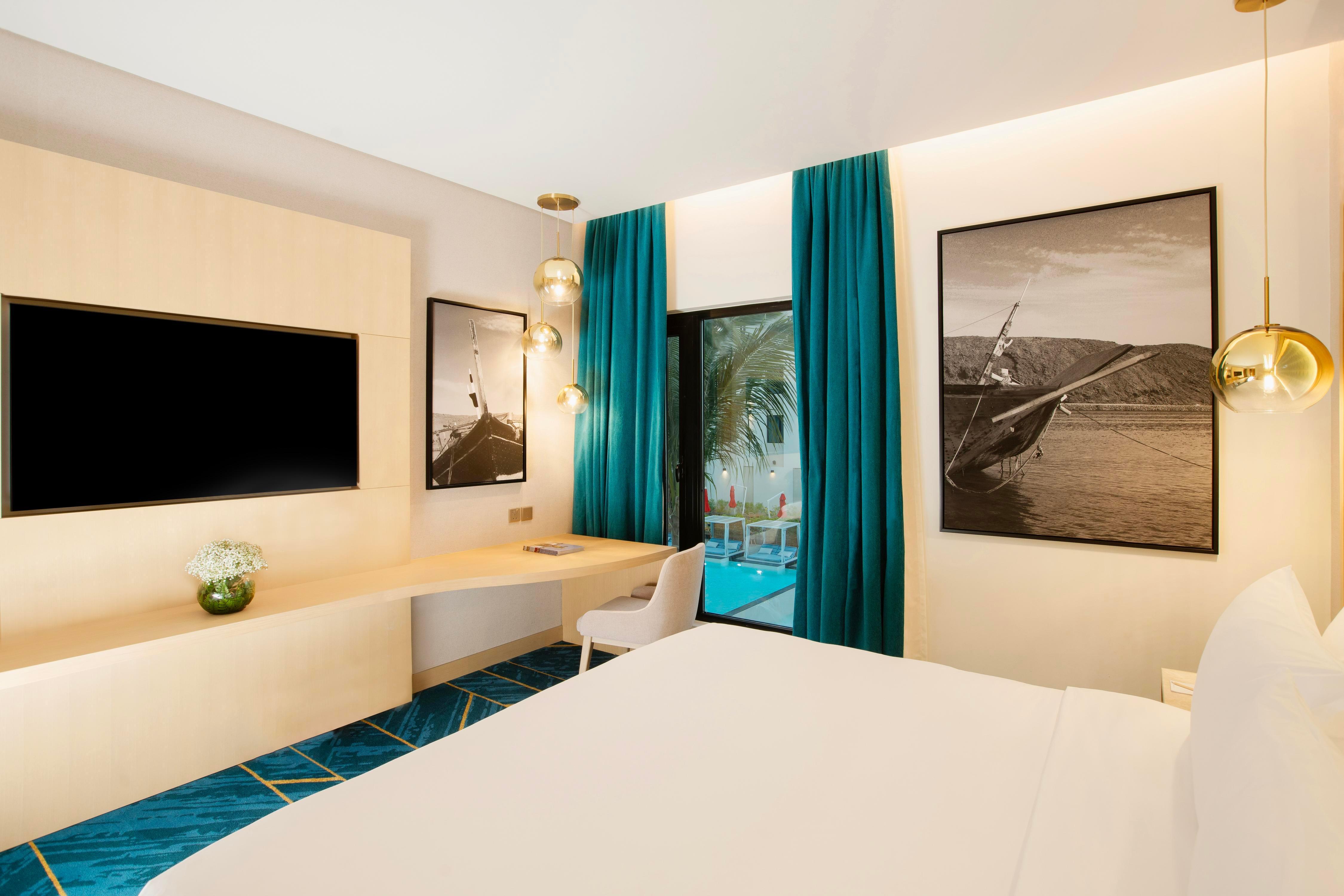 Maani Muscat Hotel and Suites Room Type - Two Bedroom Apartment Pool View Maani Muscat Hotel and Suites Room Type - Two Bedroom Apartment Pool View