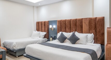 The Vaishvik ( Banganga Road ) Room Type - Deluxe 3 Bed AC Room