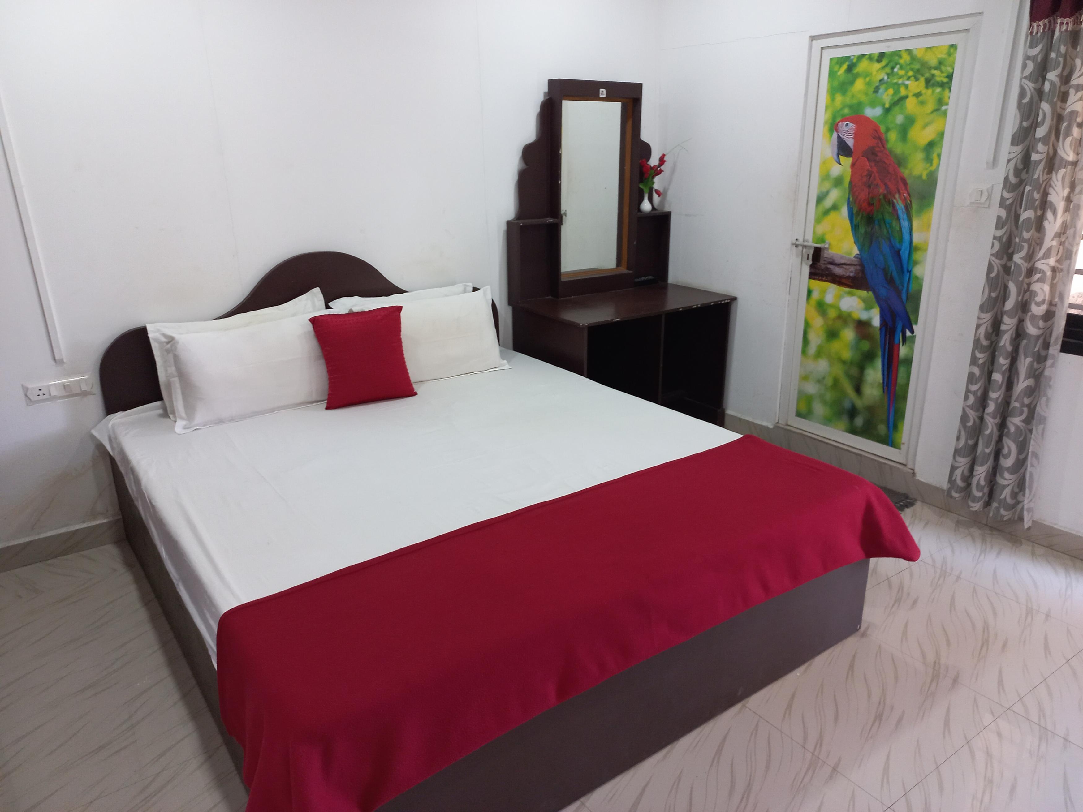 Edens Spice Residency Room Type - King bed with mountain view