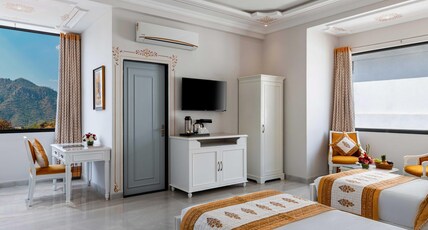 Maan Vilas | Swimming Pool | Boutique Hotel in Udaipur Room Type - Deluxe Room | Free Access to Swimming Pool. Maan Vilas | Swimming Pool | Boutique Hotel in Udaipur Room Type - Deluxe Room | Free Access to Swimming Pool.