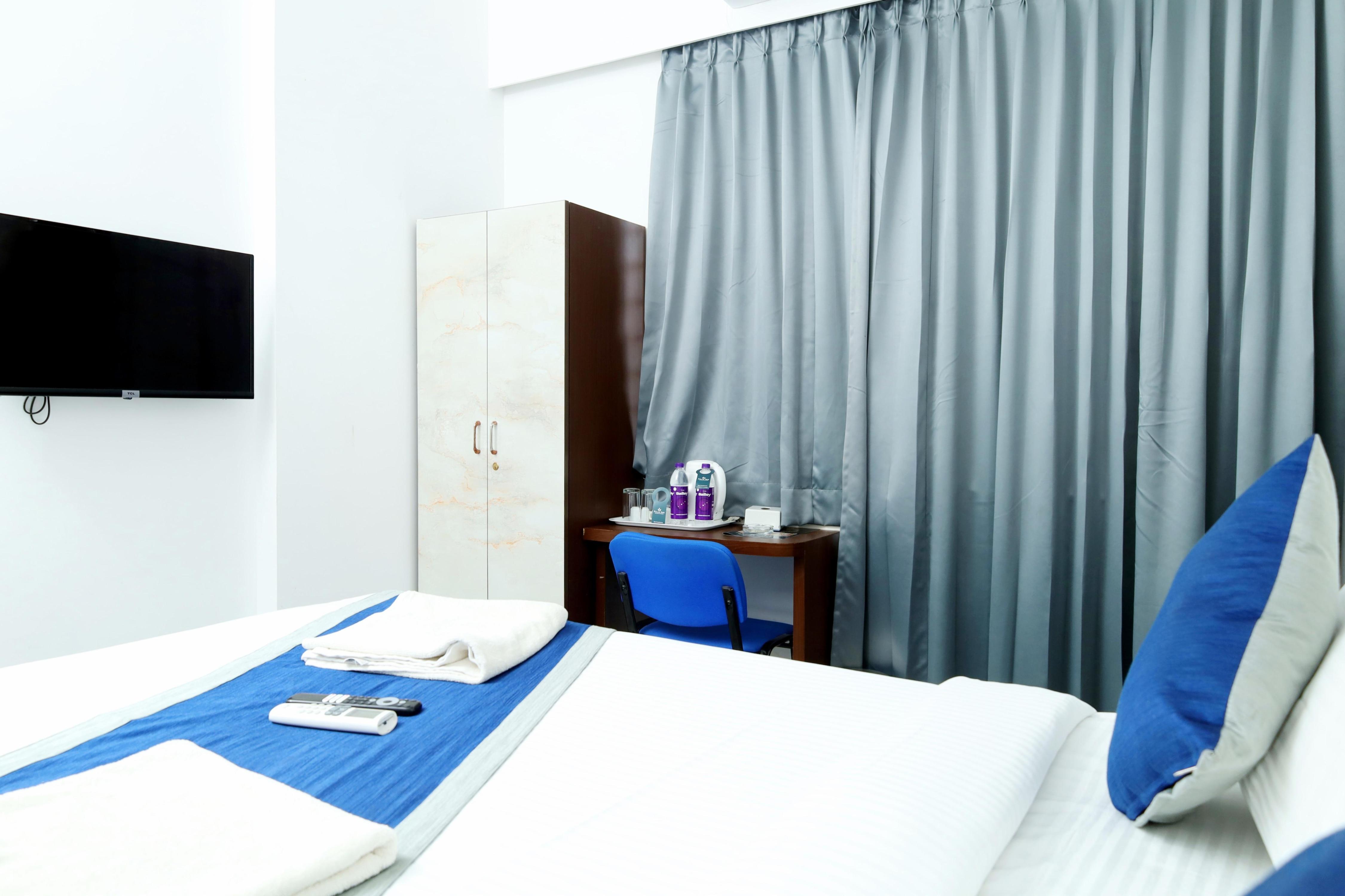 Felix Inn - Manyata Tech Park Room Type - Deluxe Queen Room Felix Inn - Manyata Tech Park Room Type - Deluxe Queen Room