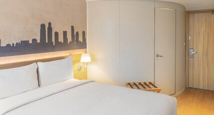 ibis Thane - An Accor Brand Room Type - Deluxe Room with one double bed on a higher floor with modern design and vibrant city views ibis Thane - An Accor Brand Room Type - Deluxe Room with one double bed on a higher floor with modern design and vibrant city views