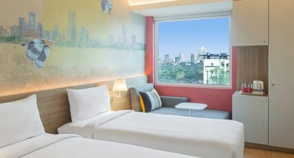 ibis Thane - An Accor Brand Room Type - Deluxe Room with 2 single beds on a higher floor with modern design and vibrant city views ibis Thane - An Accor Brand Room Type - Deluxe Room with 2 single beds on a higher floor with modern design and vibrant city views