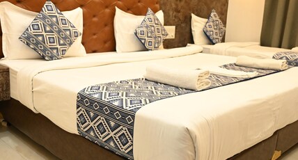 TrimHotel Shubharambh Ayodhya Room Type - Deluxe Triple Room