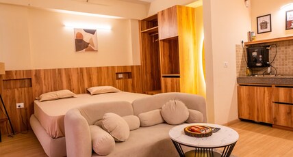Skystay Lucknow | DLF MyPad Room Type - The wooden Cabin Studio