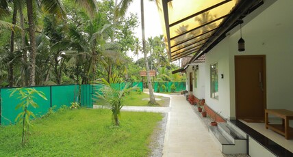 Prakruthi Residency Room Type - Deluxe Family  Room with River Front
