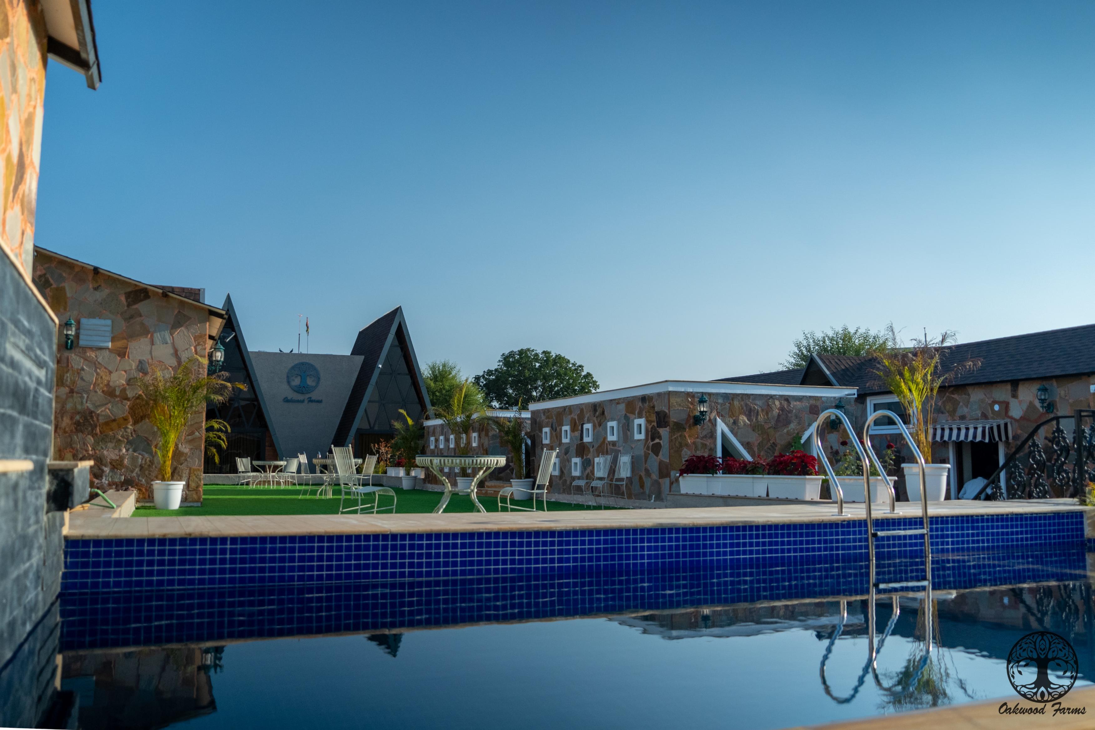 Oakwood Farms (7BHK) - Tap to explore photos