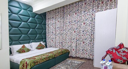 Wood Venture Residency by Stay Pattern - City Center Room Type - Deluxe Room with AC