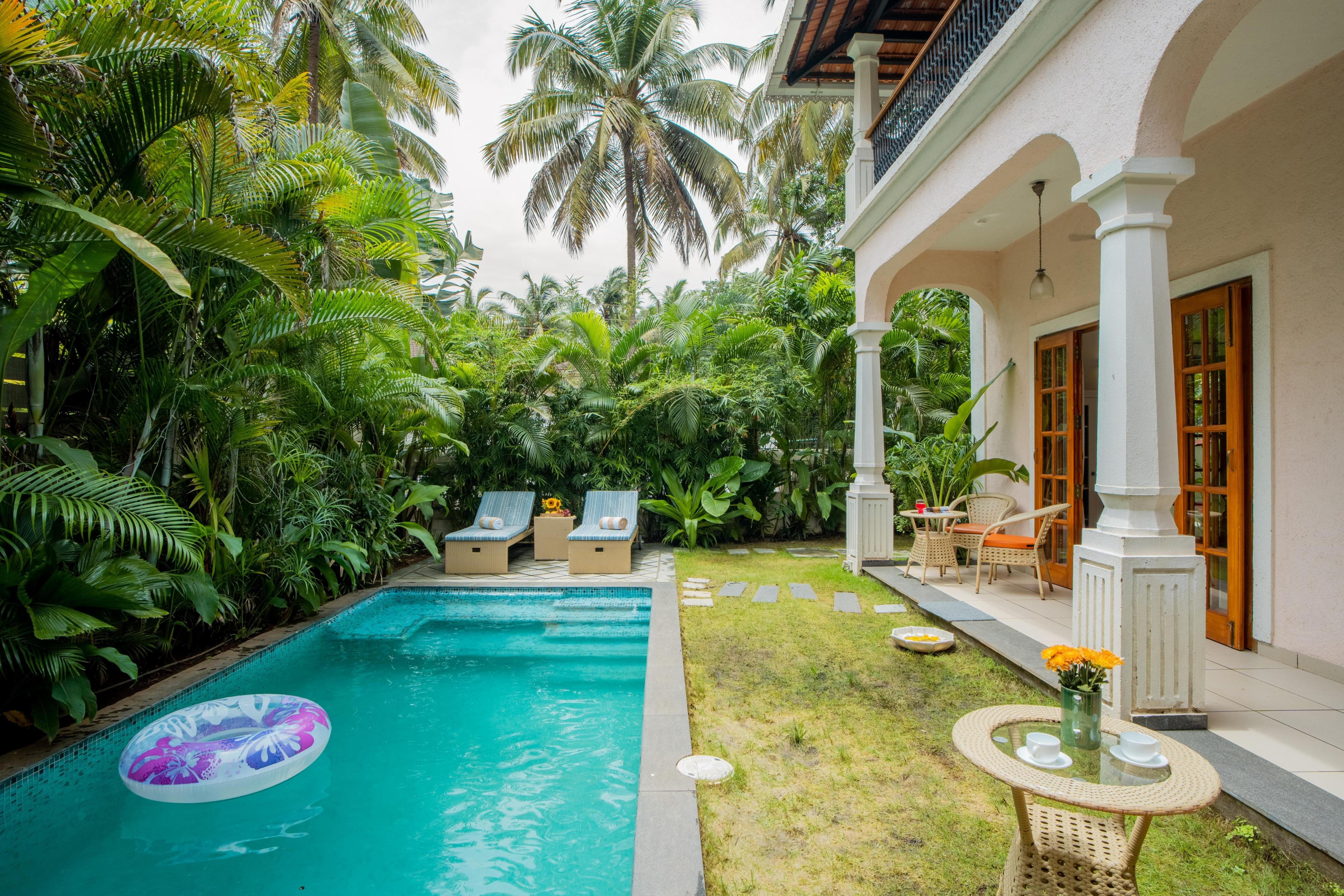 ELIVAAS Signature 4 BHK Villa with Pvt Pool Near BAGA | Celest - Tap to explore photos