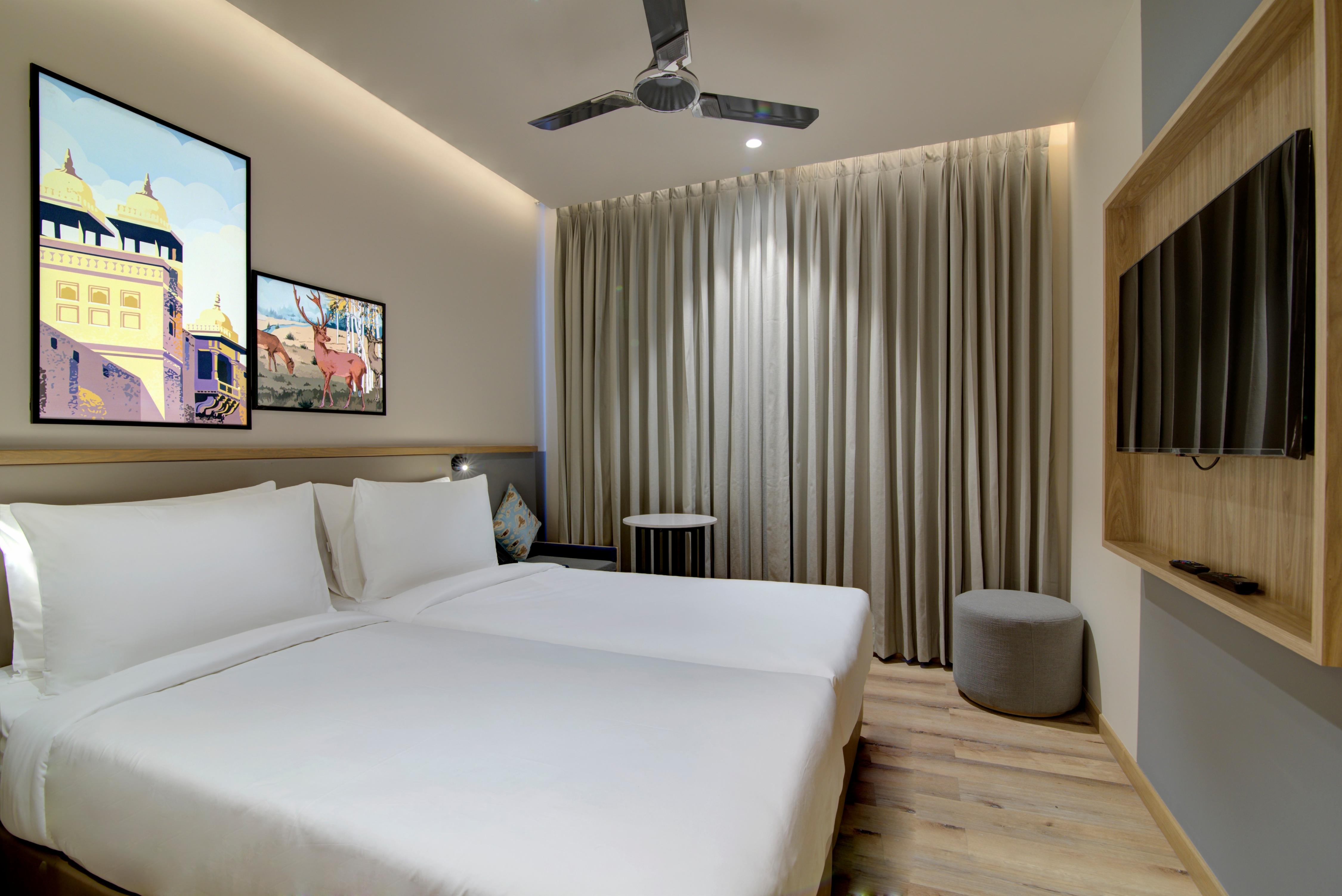 7 Apple Hotel Pratap Nagar - Tap to explore photos