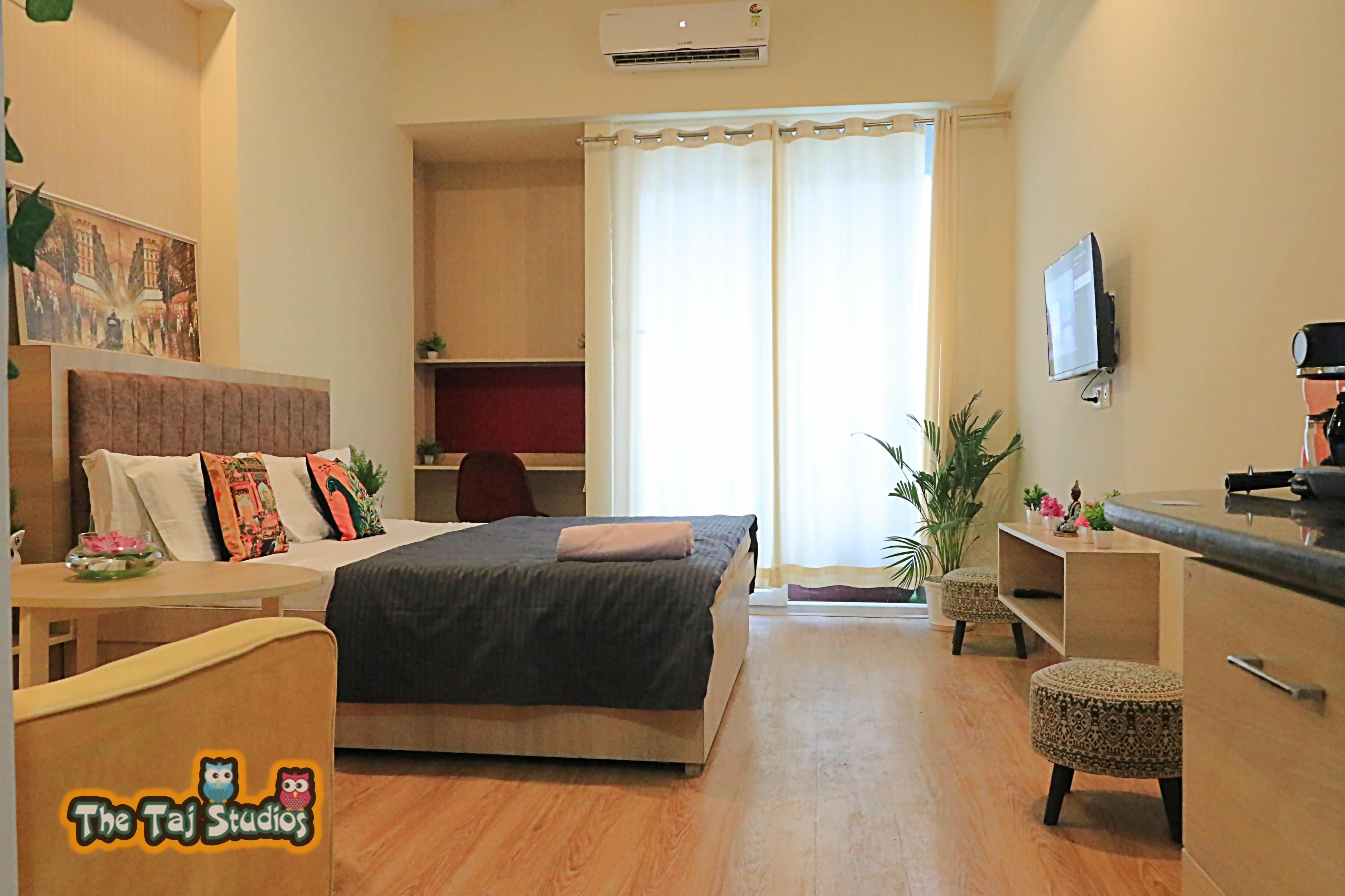 The Taj Studios-Comfortable Stay At Gaur City MAll - Tap to explore photos