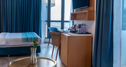 UMET Seaview Hotel with free return airport transfer Room Type - Premium Seaview suite with balcony