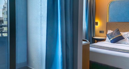 UMET Seaview Hotel with free return airport transfer Room Type - Deluxe Seaview Suite with balcony