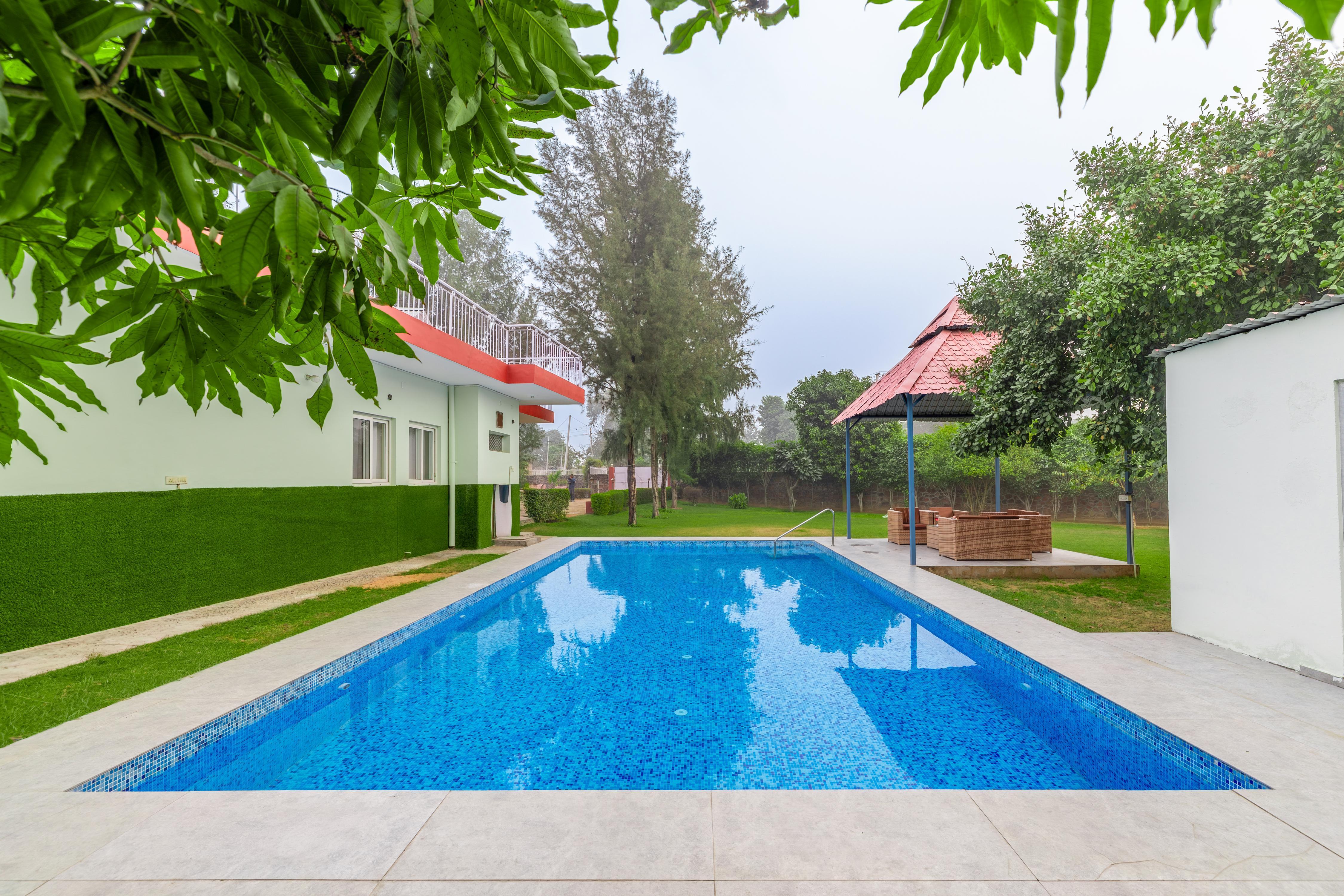 Alaya Stays 4BHK Farmhouse with Pvt Pool & Garden | Manesar - Tap to explore photos