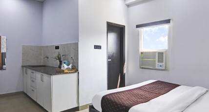 Hotel The RASA at Vasundhara Room Type - Super Deluxe Room And Living Room