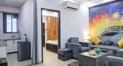 Hotel The RASA at Vasundhara Room Type - 2 Bedroom Family Room With Living Room Hotel The RASA at Vasundhara Room Type - 2 Bedroom Family Room With Living Room