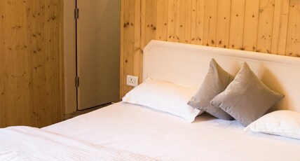 Kaffberry Homestays & Cafe  Room Type - Deluxe AC Room
