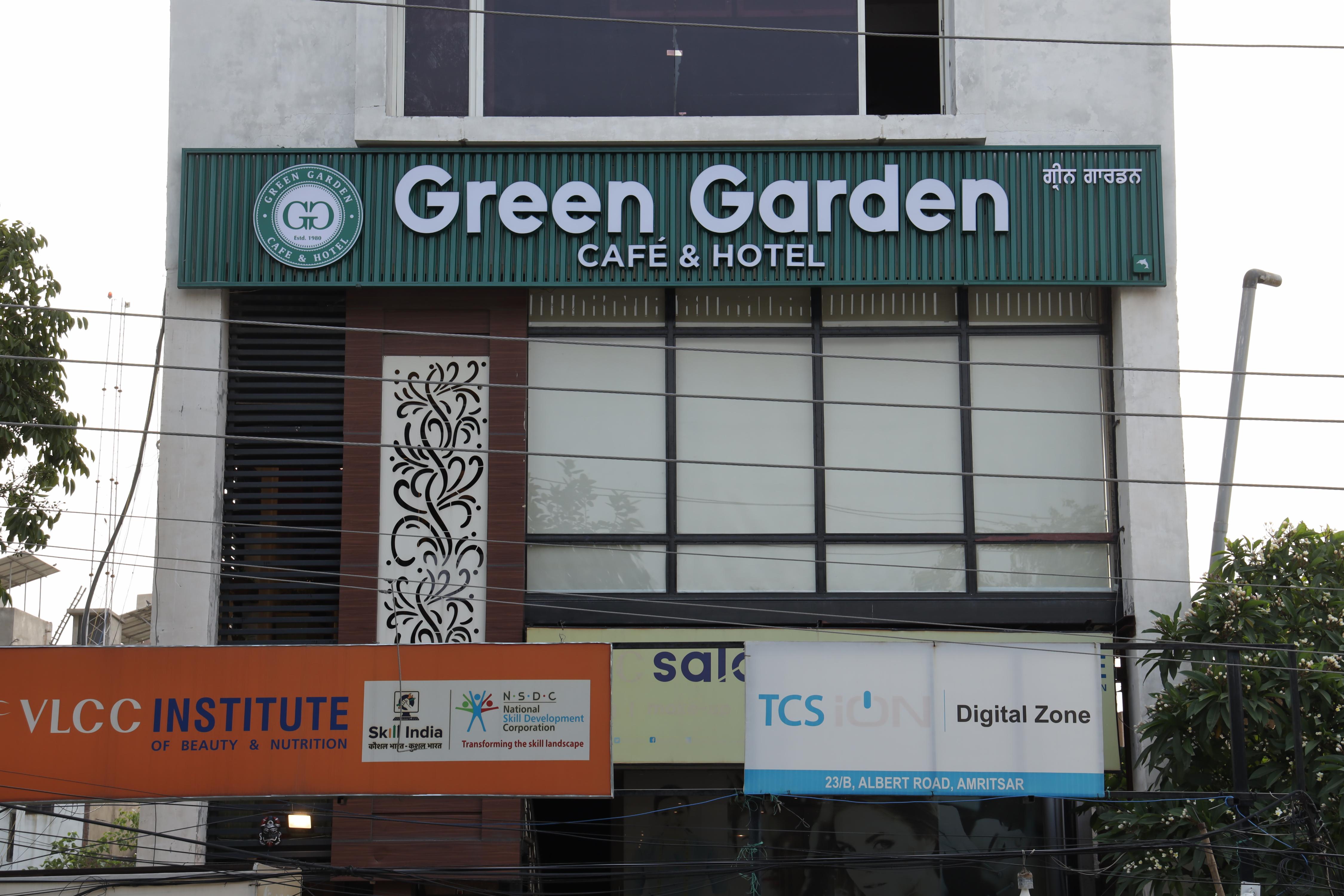 Green Garden Cafe Hotel - Tap to explore photos