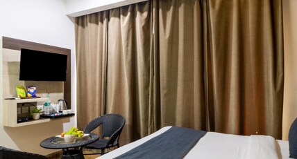 Hotel Aerostar Gold near Yashobhoomi Room Type - Deluxe Room with Window (Park View)