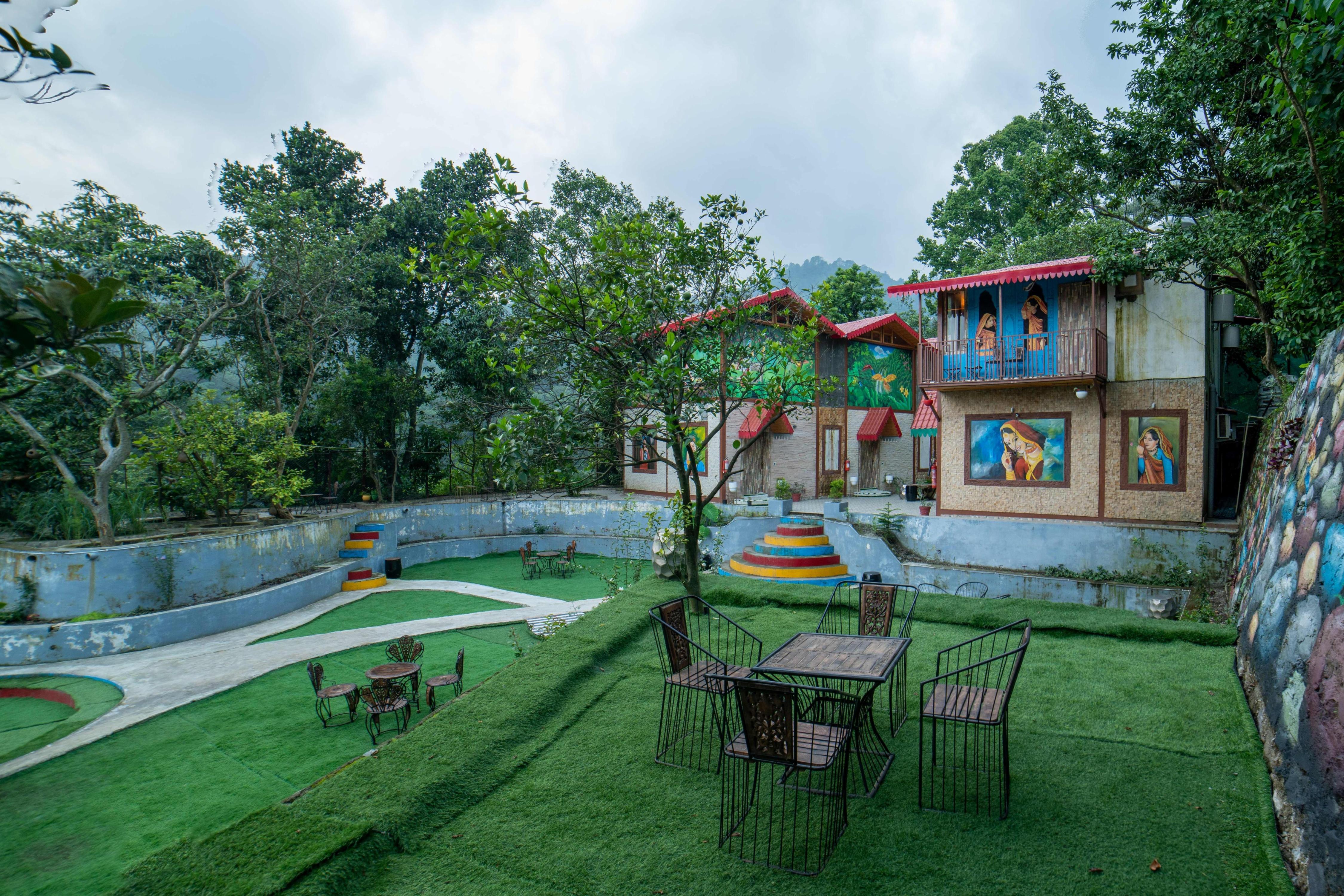 Mudras Grove Resort - Tap to explore photos