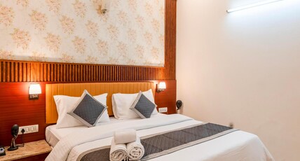 The Lodgers Hotel & Banquet Sector 38 Room Type - Deluxe Room