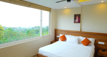 GEE Resorts and Heights Room Type - Deluxe balcony Room with Mountain View