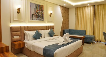 Hotel Golden Orchard @ Rajpur Road Dehradun Room Type - Executive with Balcony Room with Hill View and Working Desk Hotel Golden Orchard @ Rajpur Road Dehradun Room Type - Executive with Balcony Room with Hill View and Working Desk