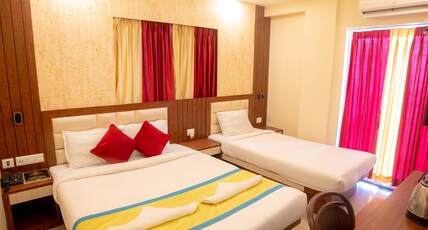 Hotel Sonajhuri , A unit of Hotel Priyadarshini Room Type - DELUXE FAMILY ROOM