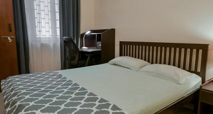 Snore Summore Room Type - Deluxe Double room with Private Bathroom