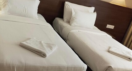 Hotel Supriya International Sirsi Room Type - Deluxe AC Twin bed